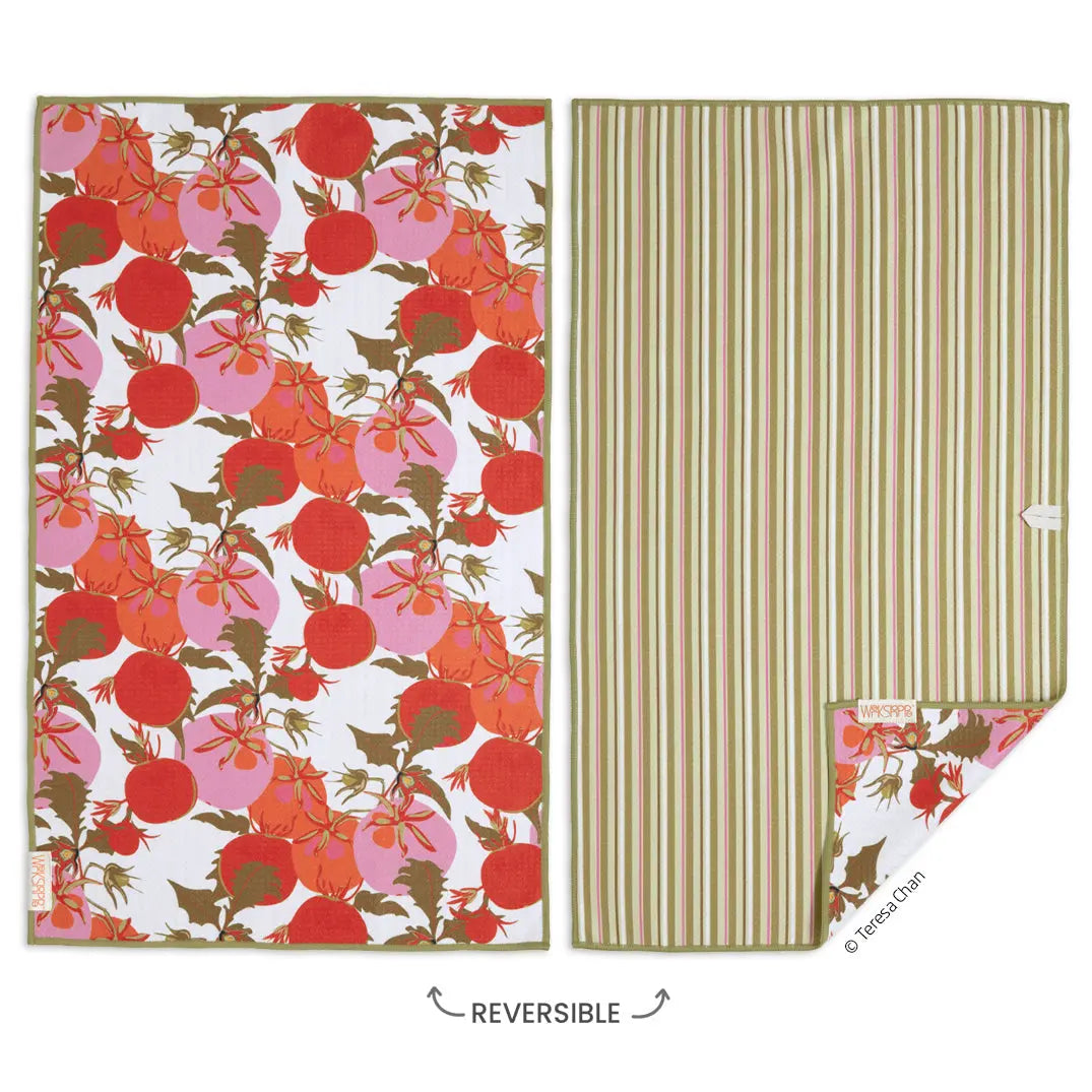 Reversible microfiber towel with red/pink tomato pattern on white, and olive green and pink stripes on the reverse.