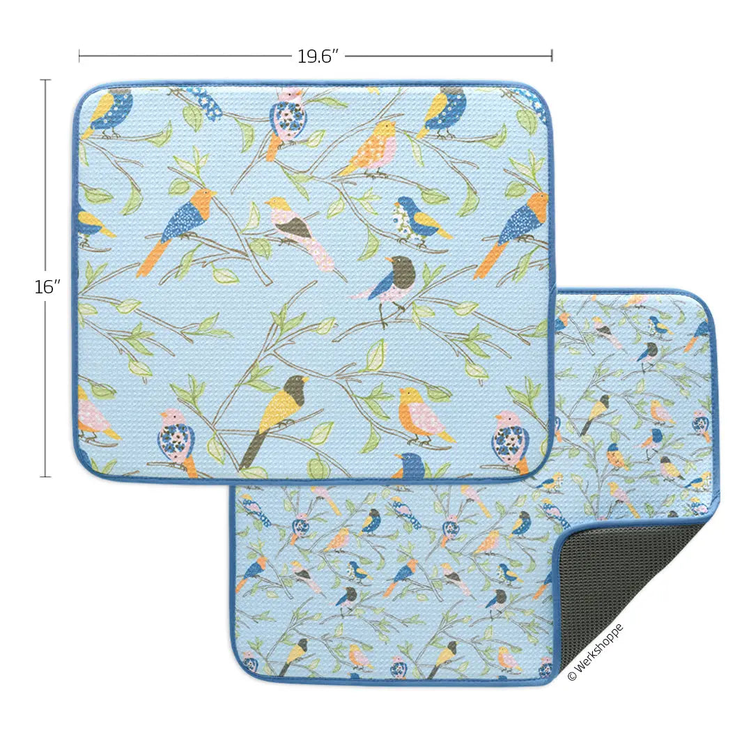 Two rectangular dish drying mats with a light blue background, bird and branch pattern, and dark gray non-slip base.