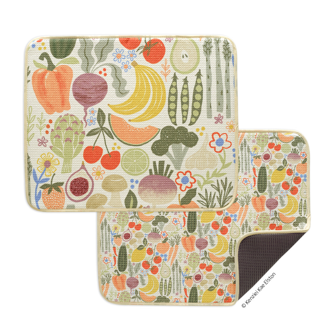 Two rectangular dish drying mats with a colorful, textured pattern of various vegetables, fruits, and small flowers.