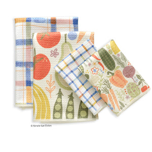 Set of four Farm Stand towels featuring vibrant, artistic prints of vegetables, fruits, and blue and yellow plaid.