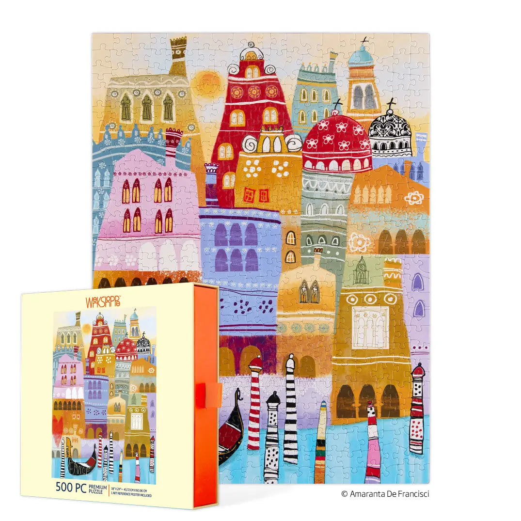 A 500-piece puzzle showing a colorful, whimsical illustration of Venice buildings and gondolas next to its box.