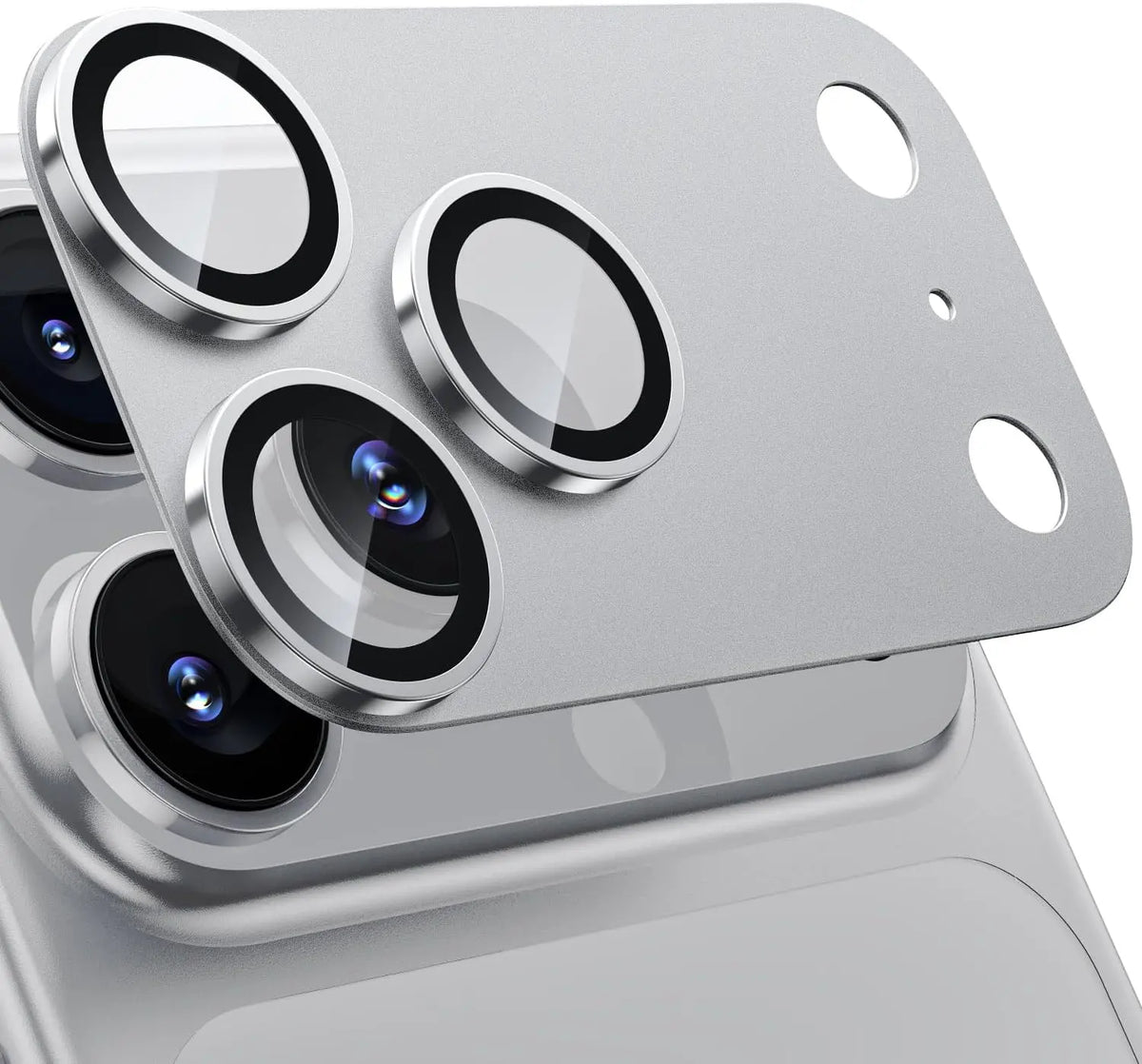 Silver titanium-style camera lens protector being applied to an iPhone triple-lens camera module.