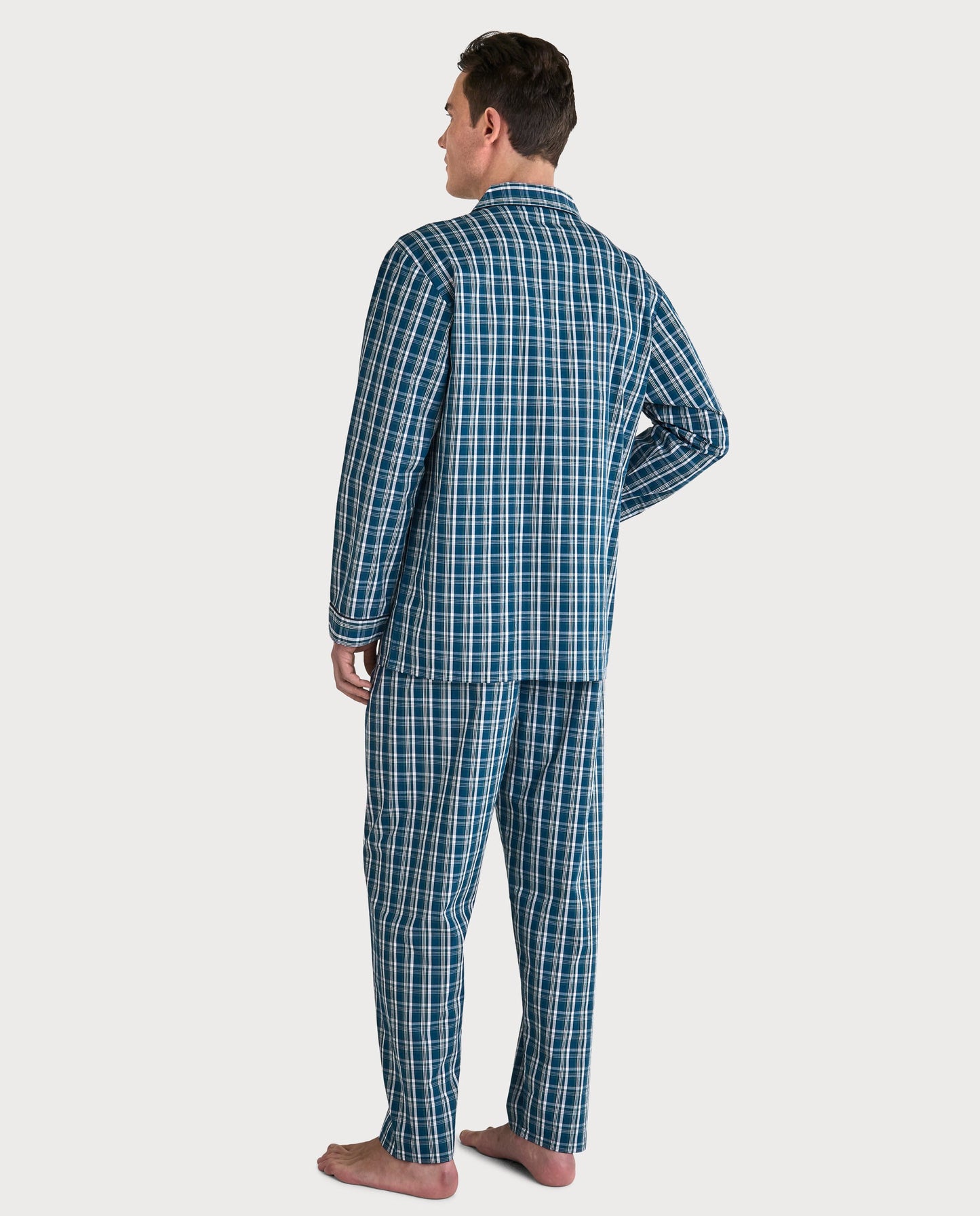 Pijama de hombre de cuadros en azul marino y verde, 100% algodón, estilo clásico con chaqueta y pantalones.