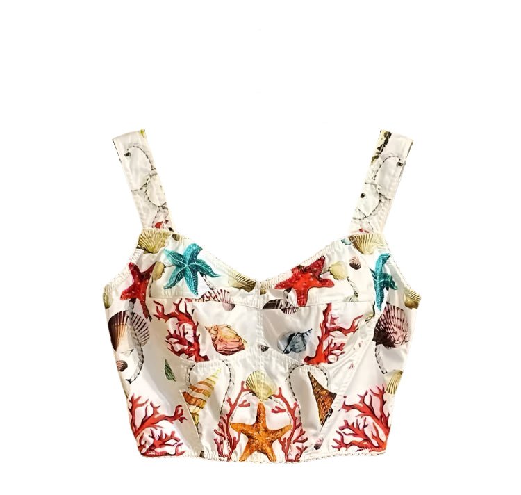 White cotton bustier top featuring a vibrant print of colorful seashells, starfish, and coral reefs.