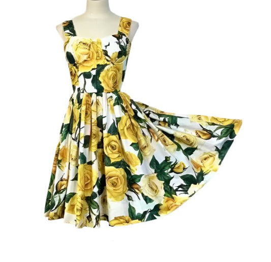 Yellow rose print A-line dress, sleeveless, crafted from lightweight cotton, perfect for spring and summer outings.