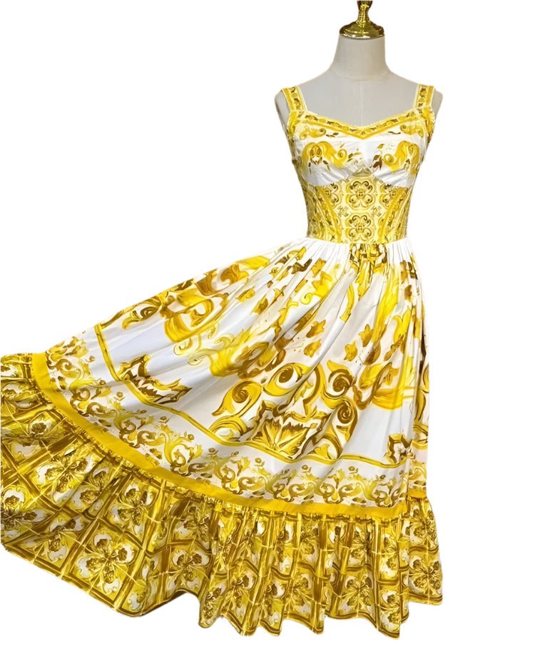 Yellow and white floral print sundress with a flared skirt and elegant detailing, perfect for summer outings.