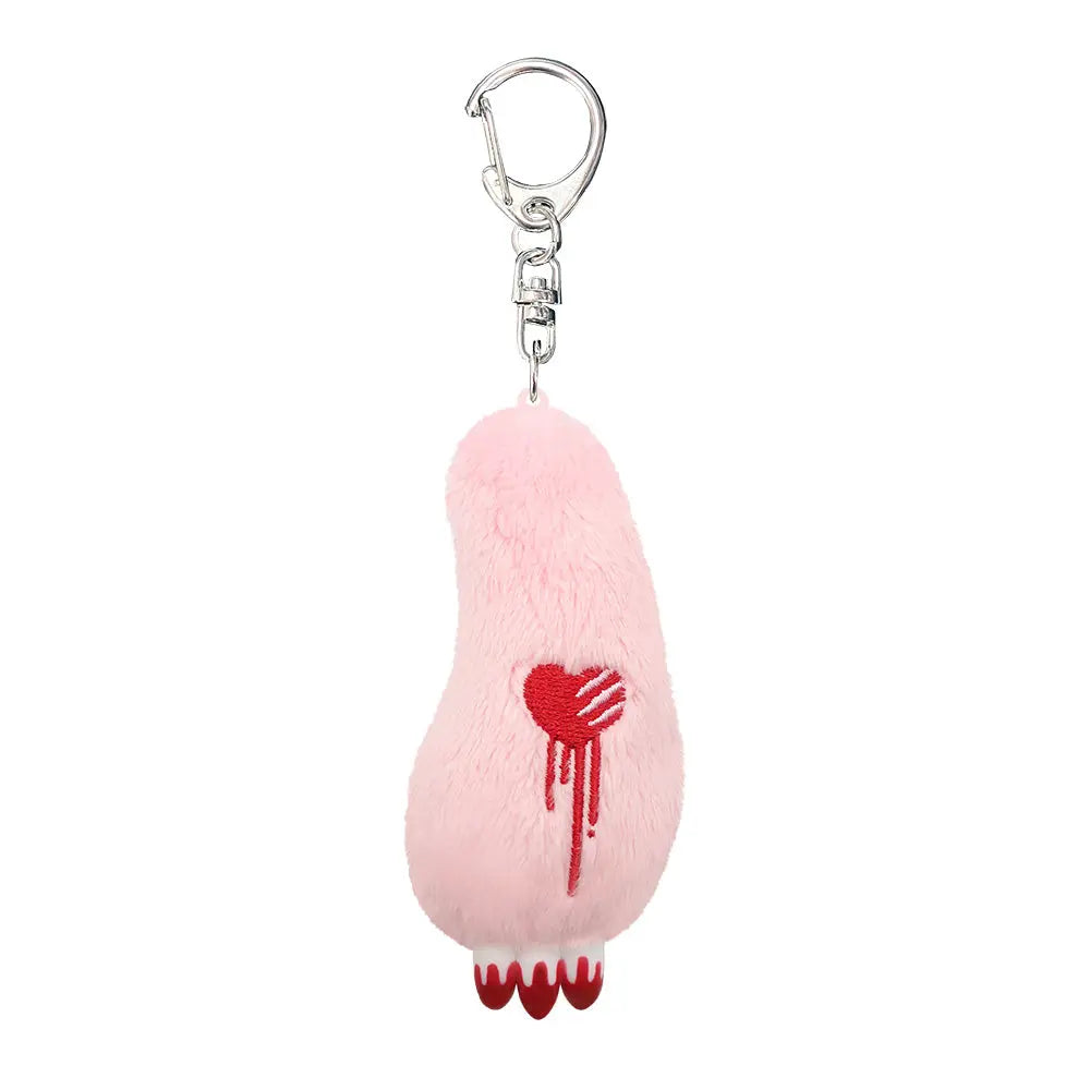 Gloomy Bear plush arm keychain in soft pink, featuring an embroidered red heart with scratch marks and red dripping.