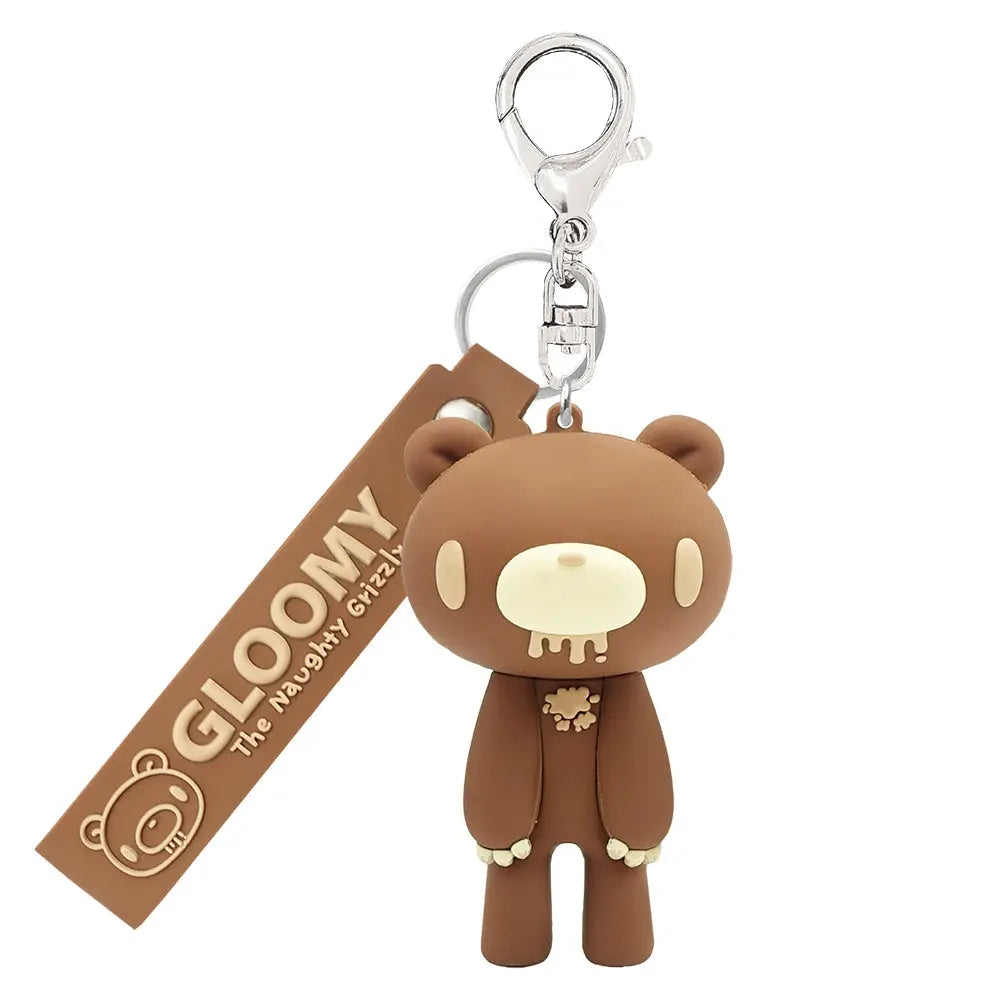Chocolate-colored Gloomy Bear rubber keychain with a matching branded strap and a silver metal clasp.