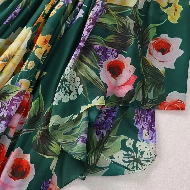 Floral print green chiffon dress with vibrant roses and lilacs, perfect for summer outings.