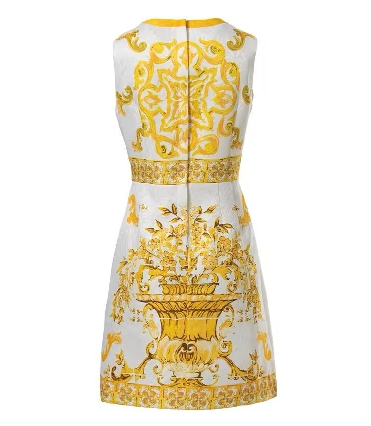 White and yellow floral-patterned sleeveless dress with a fitted silhouette and back zipper closure.