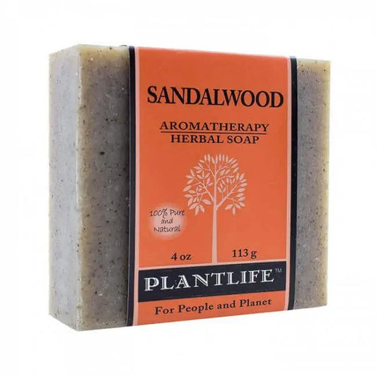 Rectangular bar of textured, grey sandalwood soap wrapped in an orange label with Plantlife branding and tree icon.