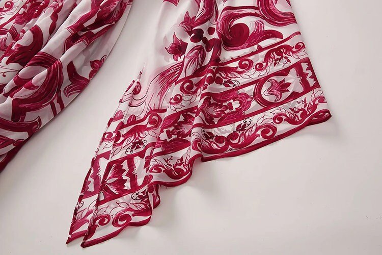 Red and white floral patterned chiffon scarf with intricate border design, perfect for stylish layering.