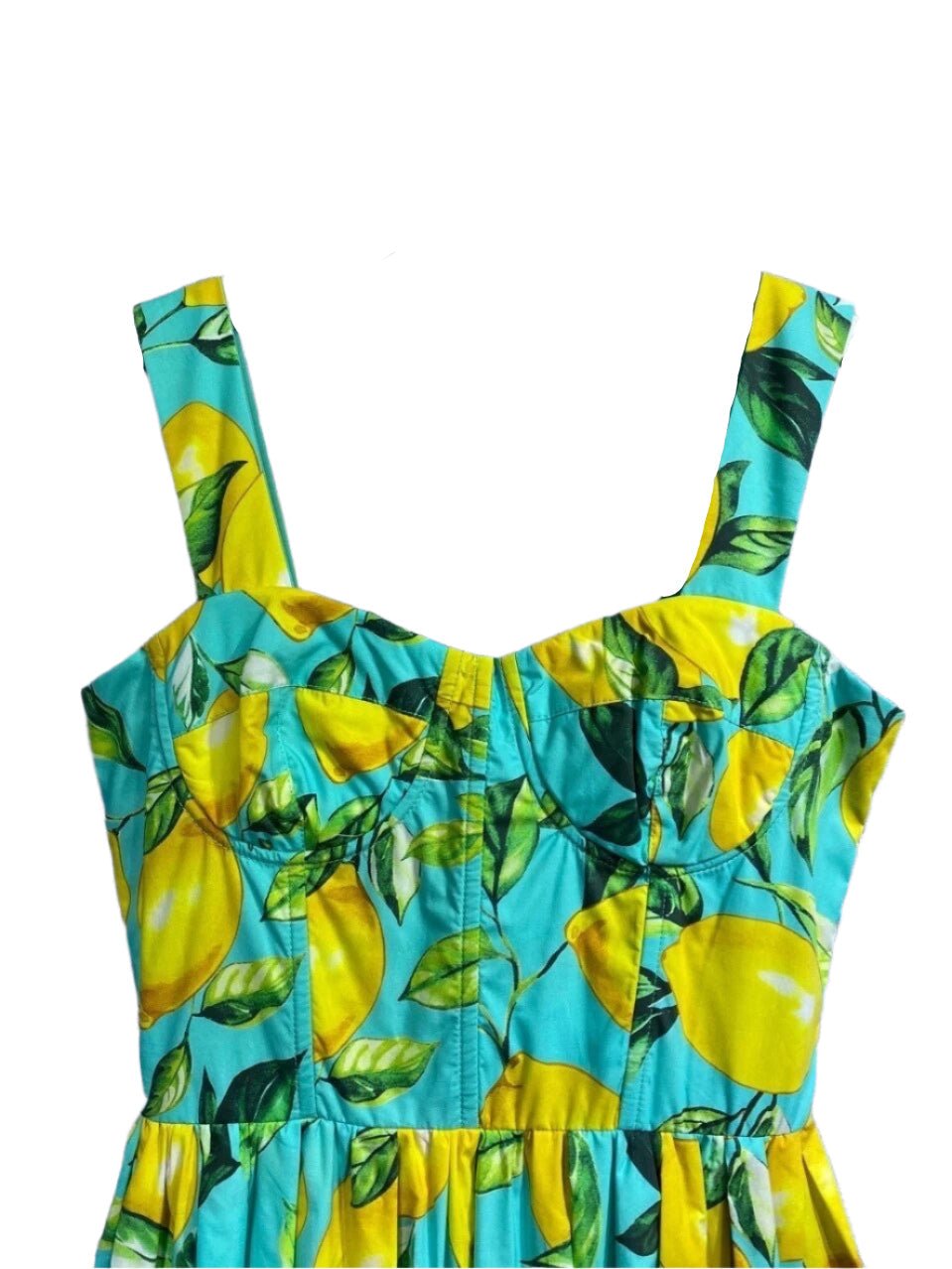 Lemon print dress with a vibrant turquoise background, featuring a fitted bodice and adjustable straps.