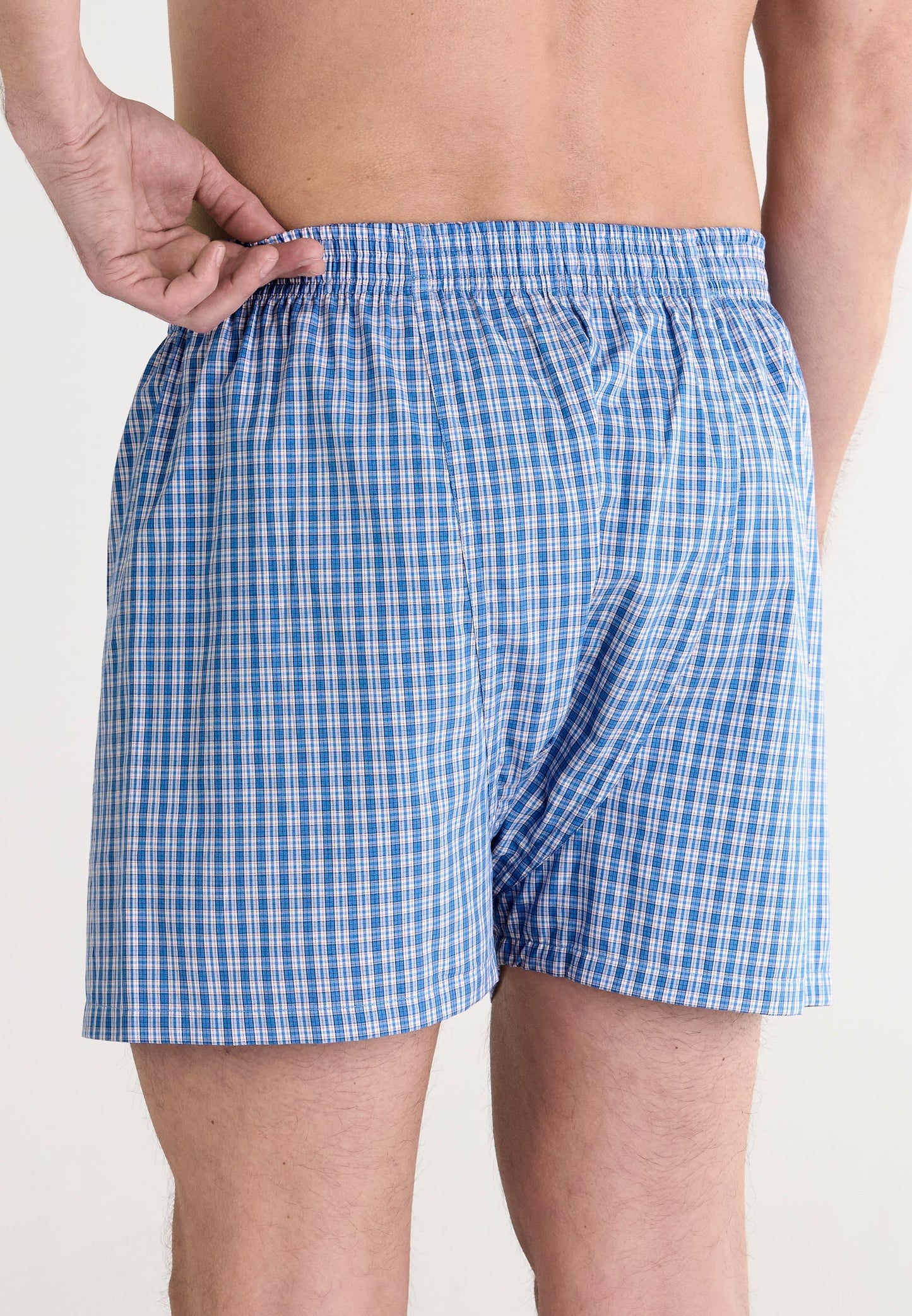 Boxers de hombre en cuadros azules y blancos, de algodón suave, estilo casual y cómodo.