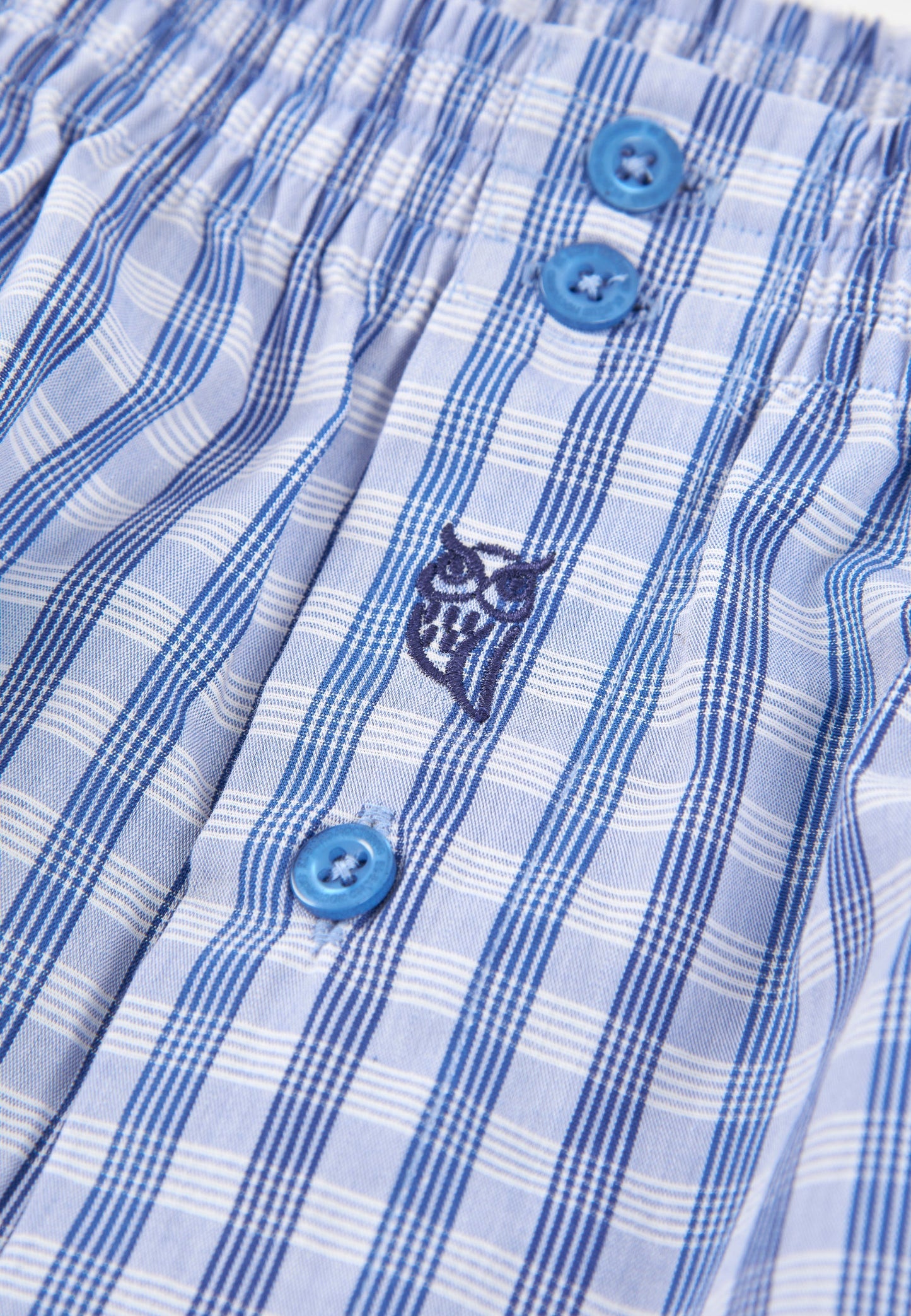 Pantalones cortos de cuadros azules y blancos, 100% algodón, con botones azules y bordado de búho.