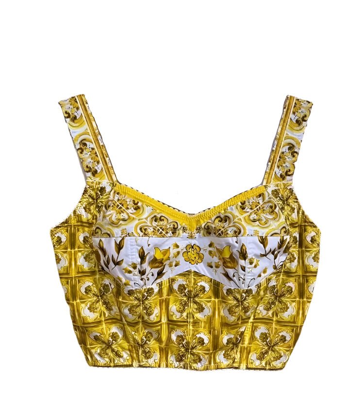 Yellow cotton corset-style crop top with white and gold floral majolica tile print and square neckline.