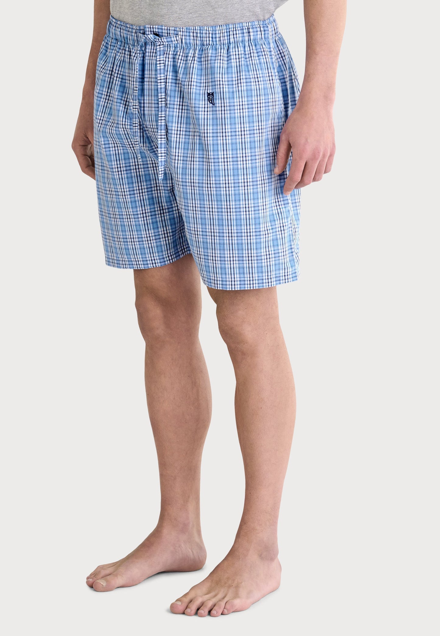 Bañador de cuadros azules y blancos para hombre, material suave y cómodo, estilo clásico y relajado.