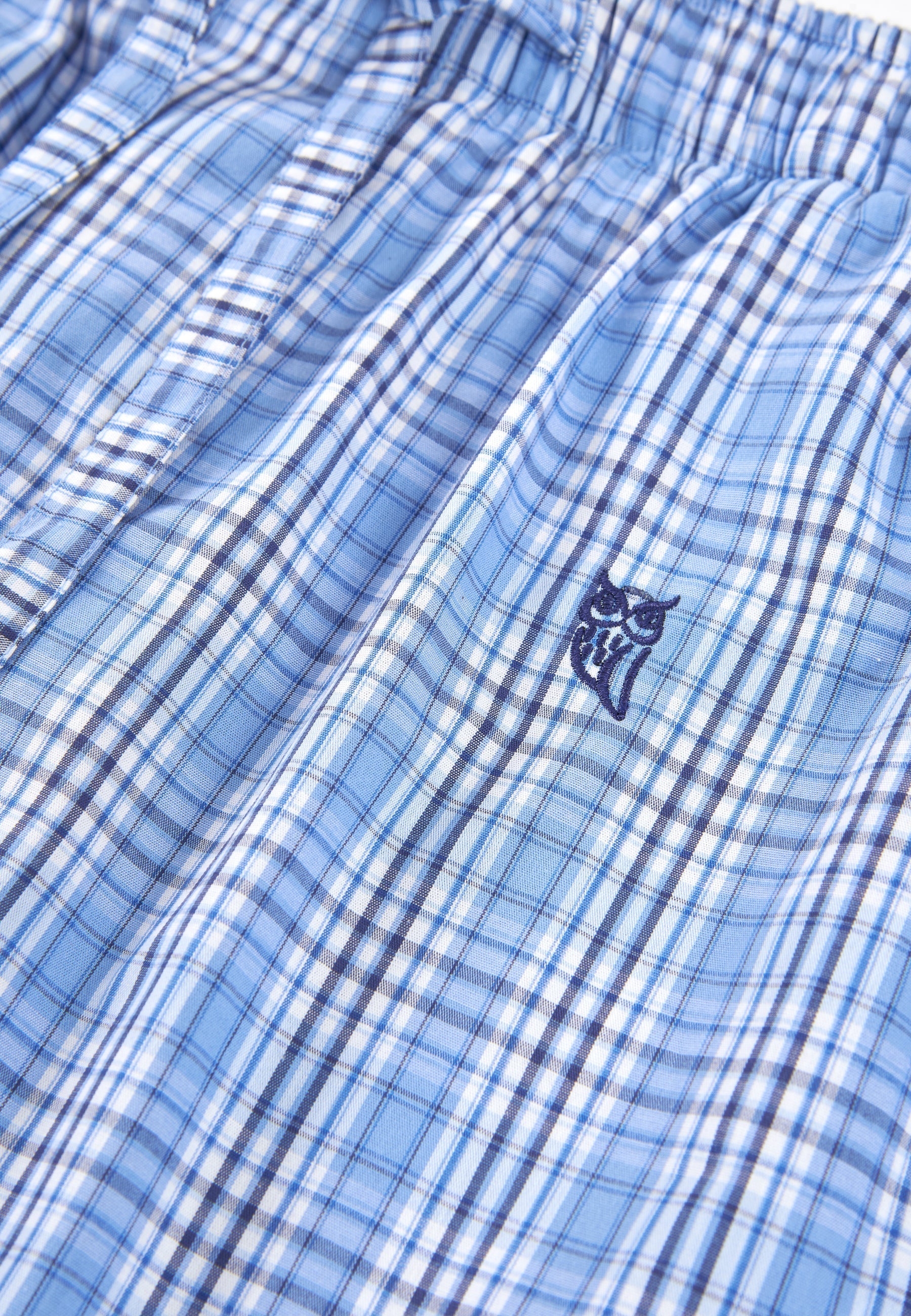 Pantalones cortos de cuadro azul y blanco, algodón suave, con bordado en la parte frontal. Ideal para uso diario.