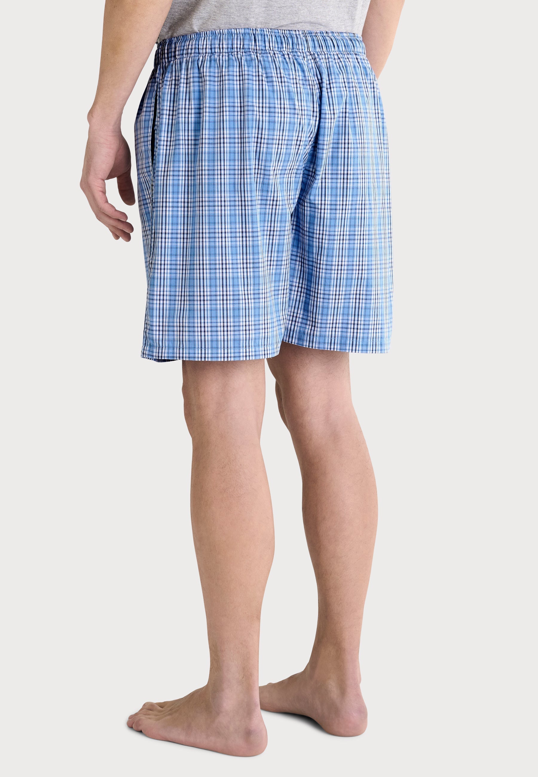 Boxers de hombre en color azul, con diseño de cuadros, de algodón con cintura elástica, comodidad y estilo casual.