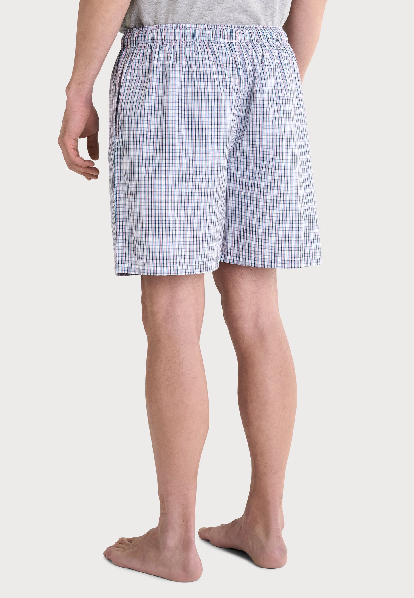 Bóxer de hombre en cuadros azul y blanco, algodón suave, estilo cómodo y relajado.