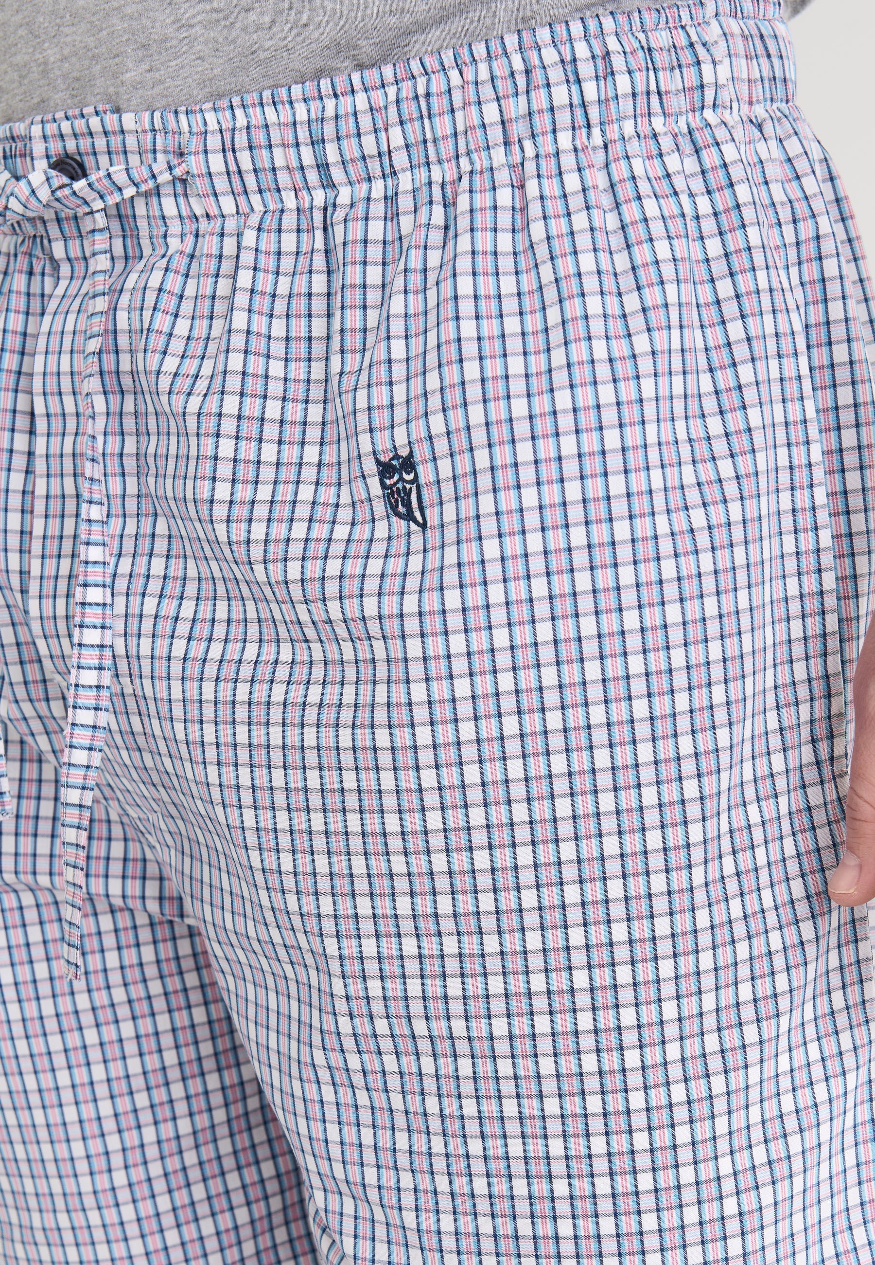 Pantalones cortos de cuadros en azul, blanco y rosa, 100% algodón, estilo casual, con cintura elástica y cordón ajustable.