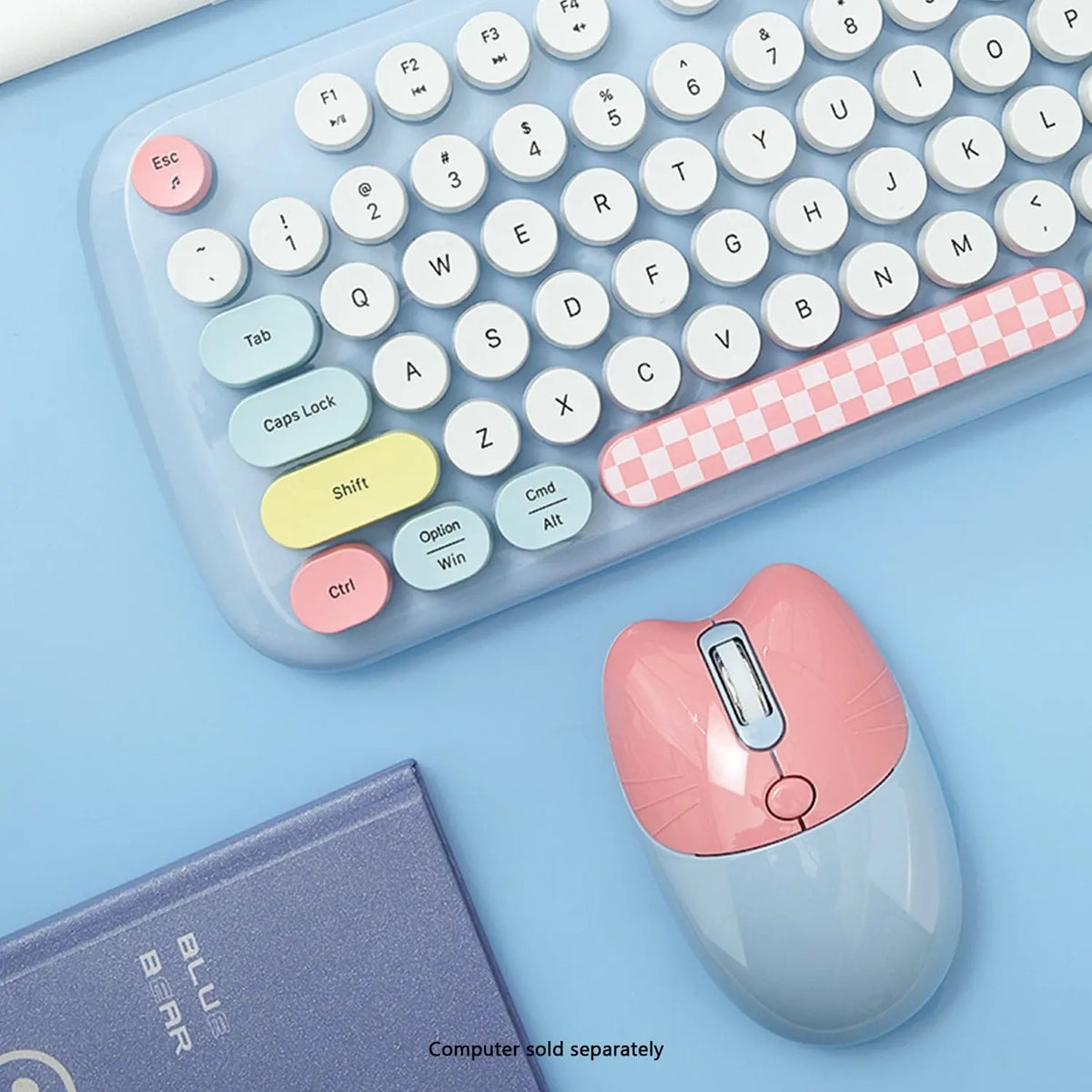 Pastel keyboard with multicolored circular keys and pink checkered spacebar, next to a pink and blue cat-shaped mouse.