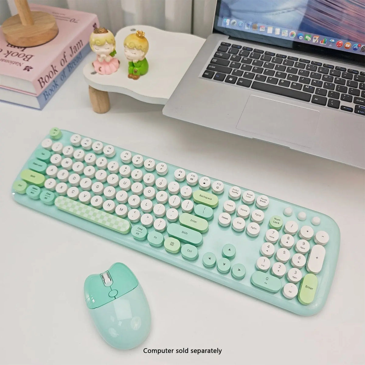 Mint green and white 104-key wireless keyboard and mouse set with rounded keys and a minimalist aesthetic.