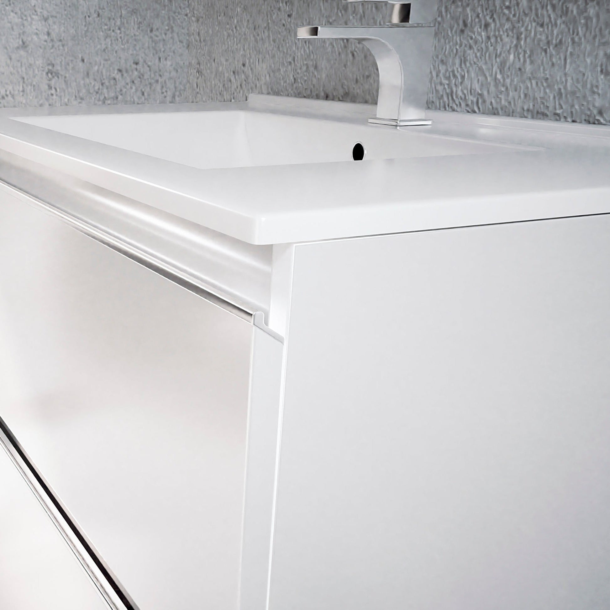 Detalle cajones con cierre amortiguado – mueble blanco brillo baño