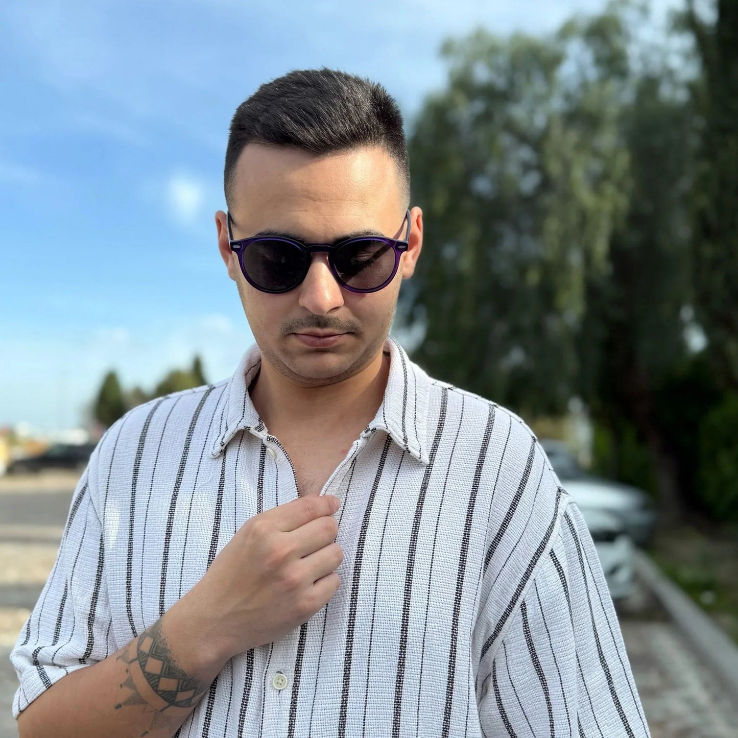 Begur · gafas de sol redondas moradas