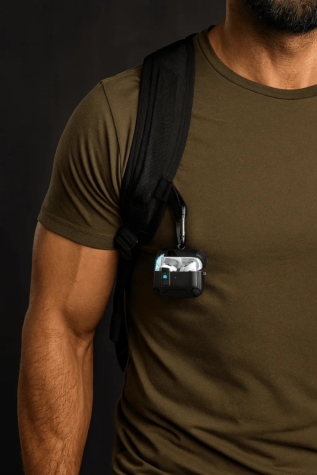 Black heavy-duty AirPods Pro case with secure latch, hanging from a backpack strap via a metal carabiner.