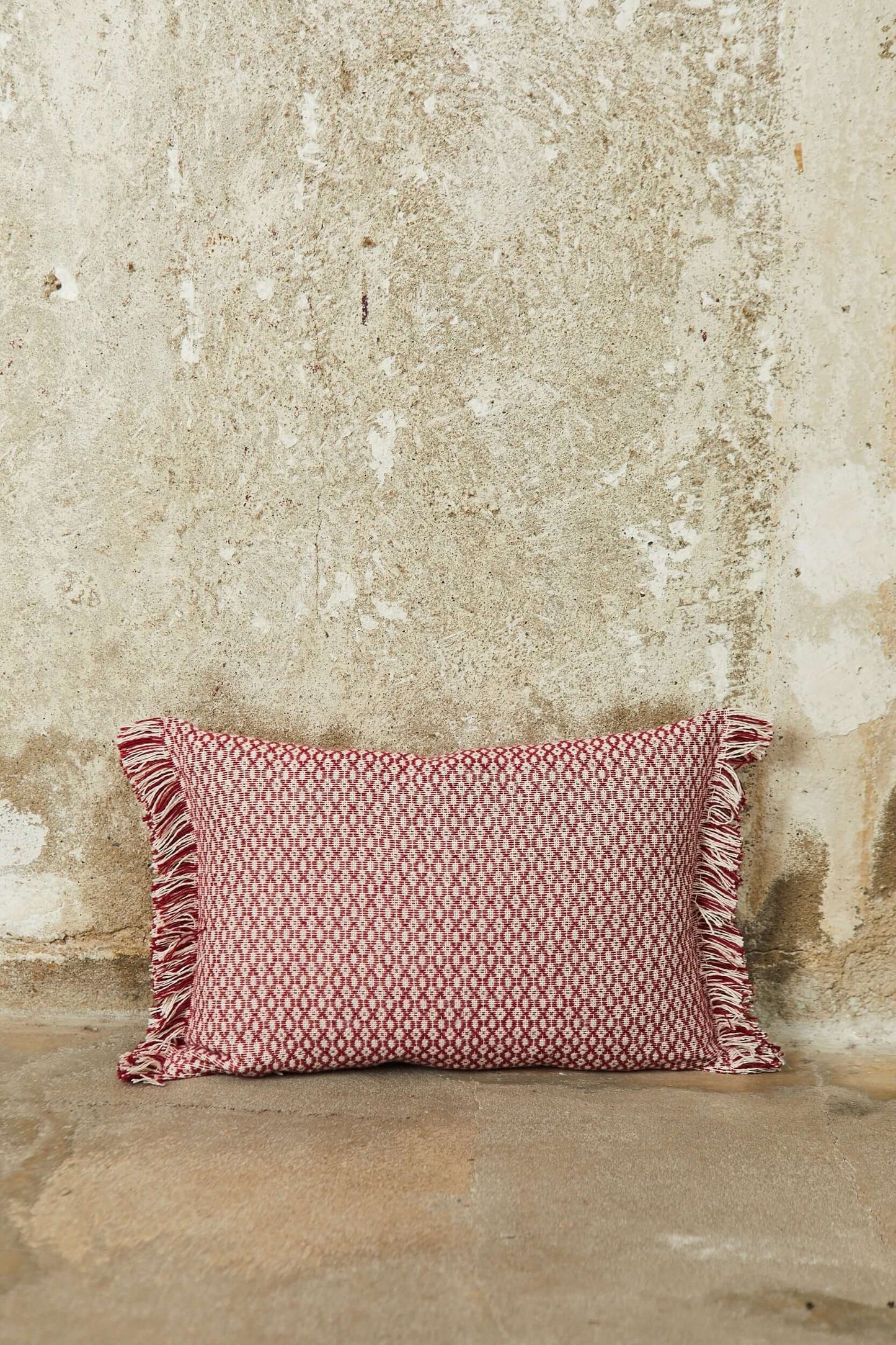 Funda cojín ojo de perdiz granate 30cmx45cm