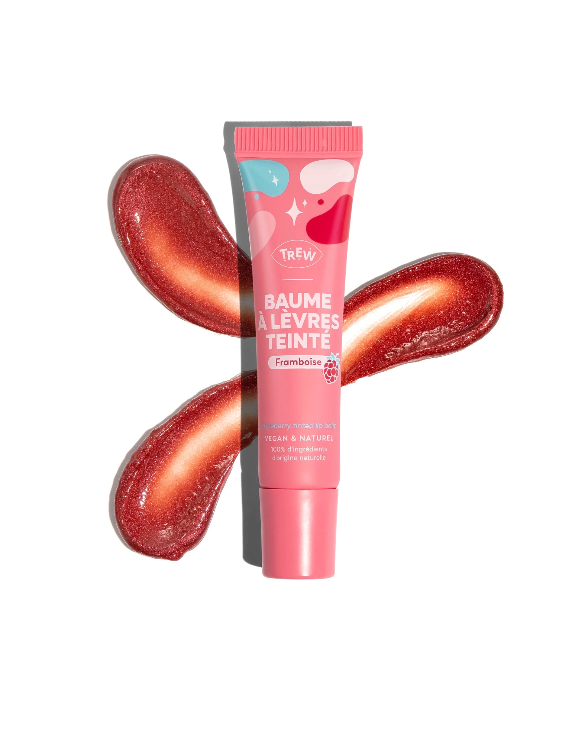 Pink tube of raspberry tinted lip balm centered over two glossy, deep red product swatches on a white background.