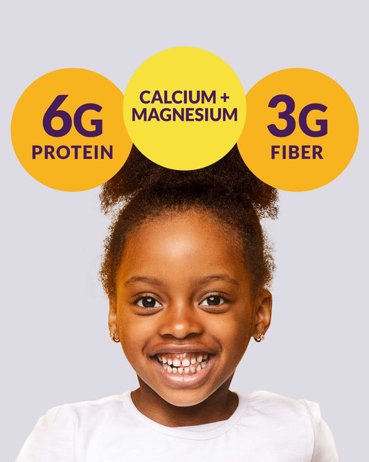 Smiling girl showcasing nutrition facts: 6g protein, calcium + magnesium, 3g fiber for banana smoothie pouches.
