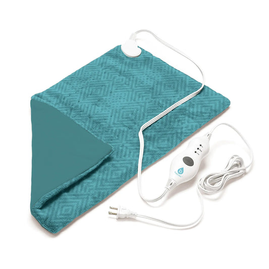 Teal, rectangular electric heating pad with a textured geometric pattern, a corded remote, and a white power plug.