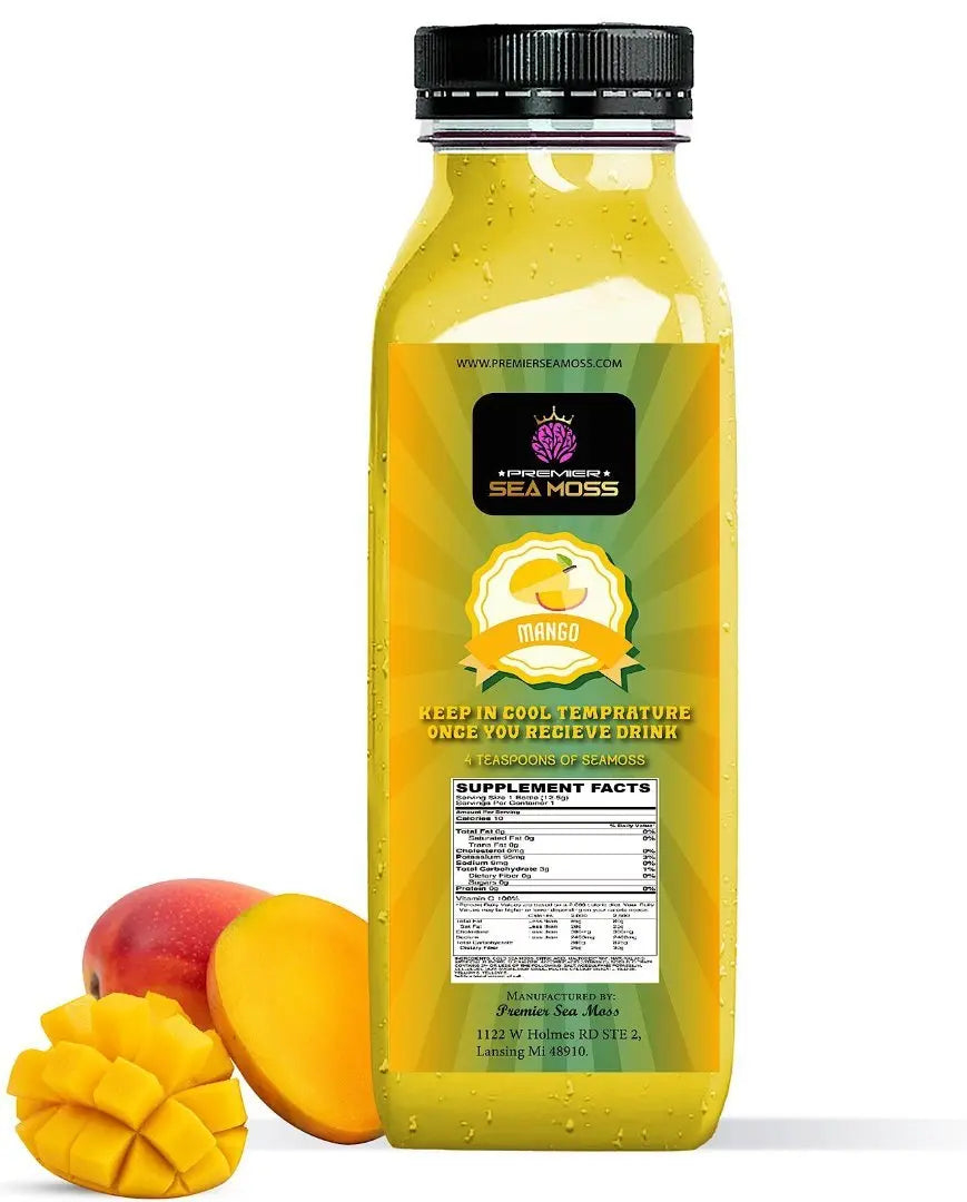12 oz. plastic bottle of yellow mango-flavored sea moss lemonade with a branded label and fresh mangoes.
