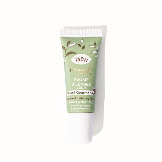 Sage green squeeze tube of lip balm with white cap, featuring brown text and leaf illustrations on a white background.