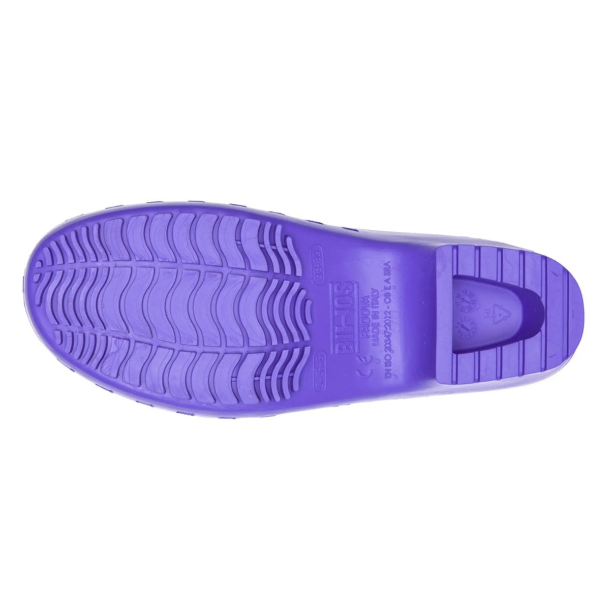 Bottom view of a bright purple clog, showcasing a textured, non-slip sole and Italian manufacturing details.