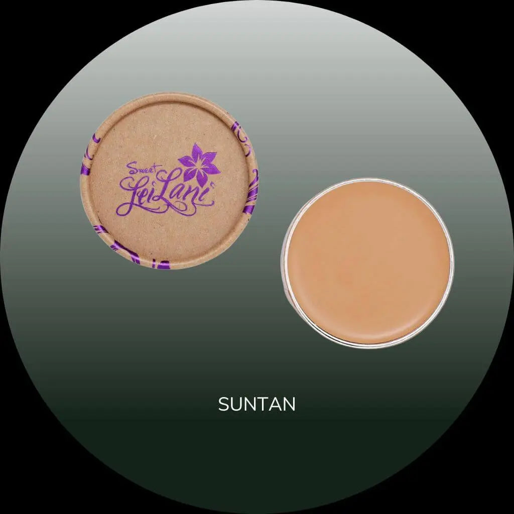 Suntan shade foundation cream in a round tin with a matching cardboard lid featuring the purple Sweet LeiLani logo.