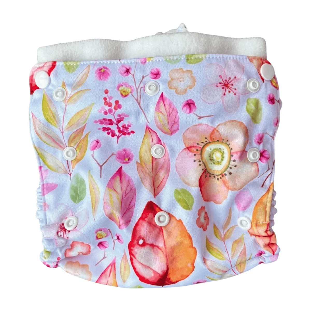 All-in-two diaper cover with a floral and leaf print, white snaps, and a soft white interior lining.
