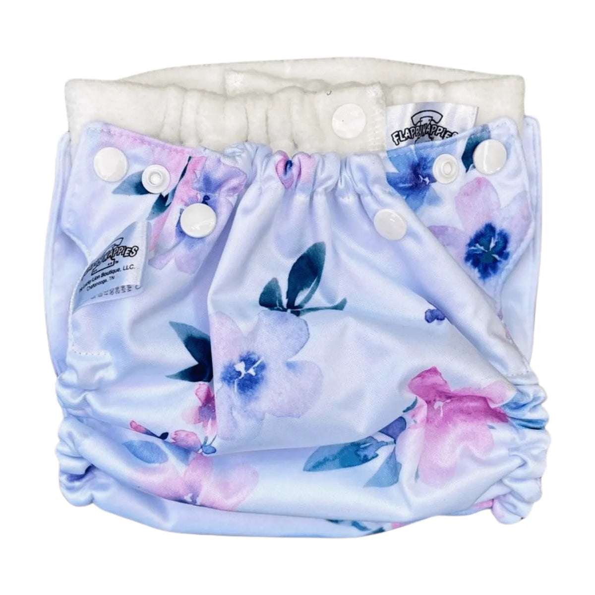 All-in-two diaper cover in light blue with watercolor floral print, white snaps, and soft white inner liner.