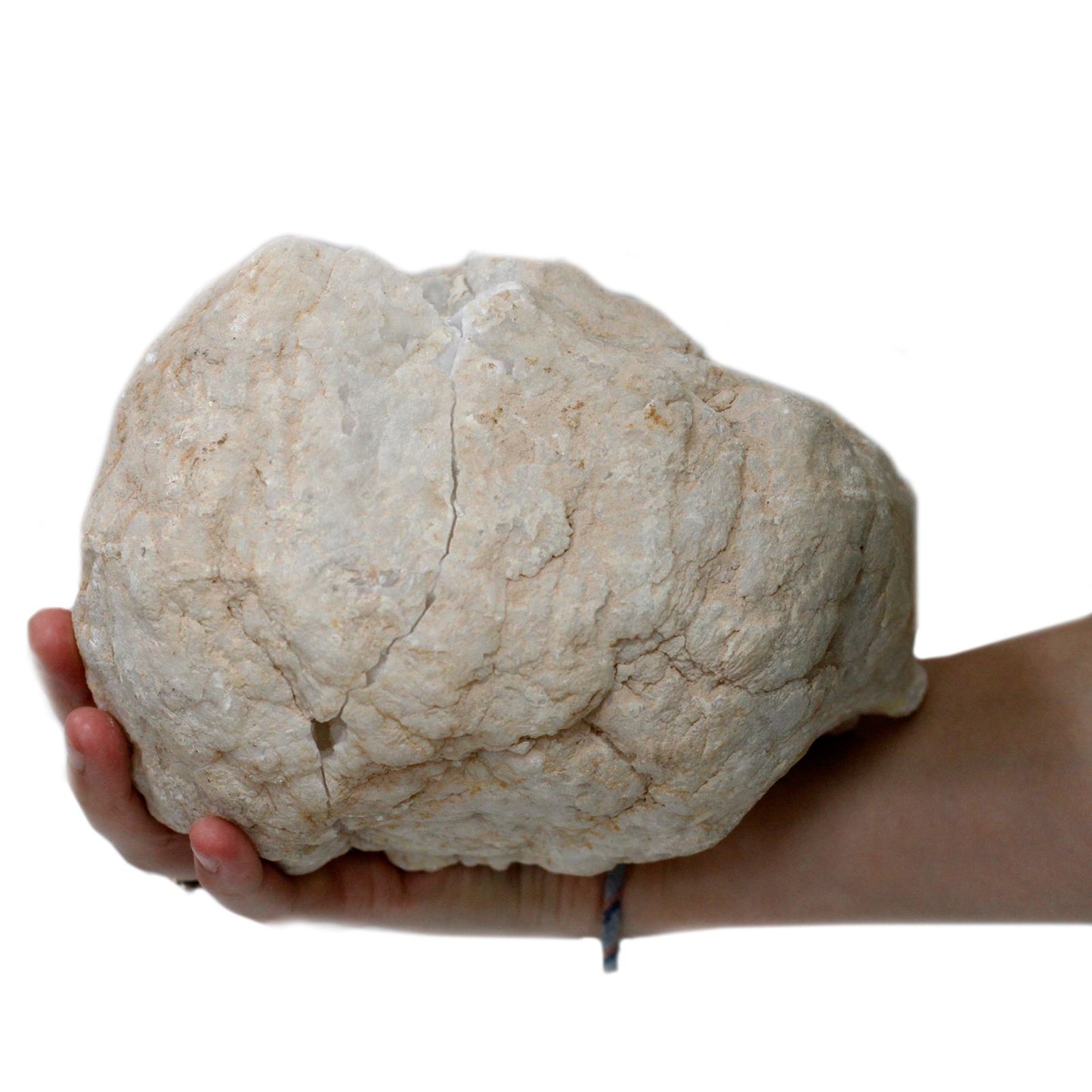 Piedra natural grande color beige, textura rugosa, ideal para decoración y manualidades.