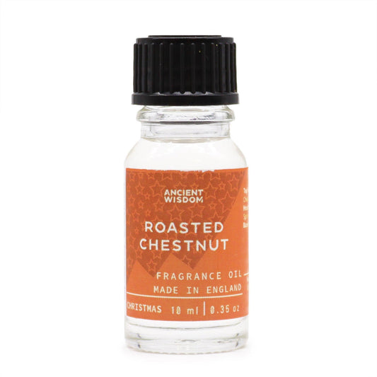 Frasco de vidrio de 10 ml con tapón negro y etiqueta naranja con texto blanco de aceite de fragancia de castañas.