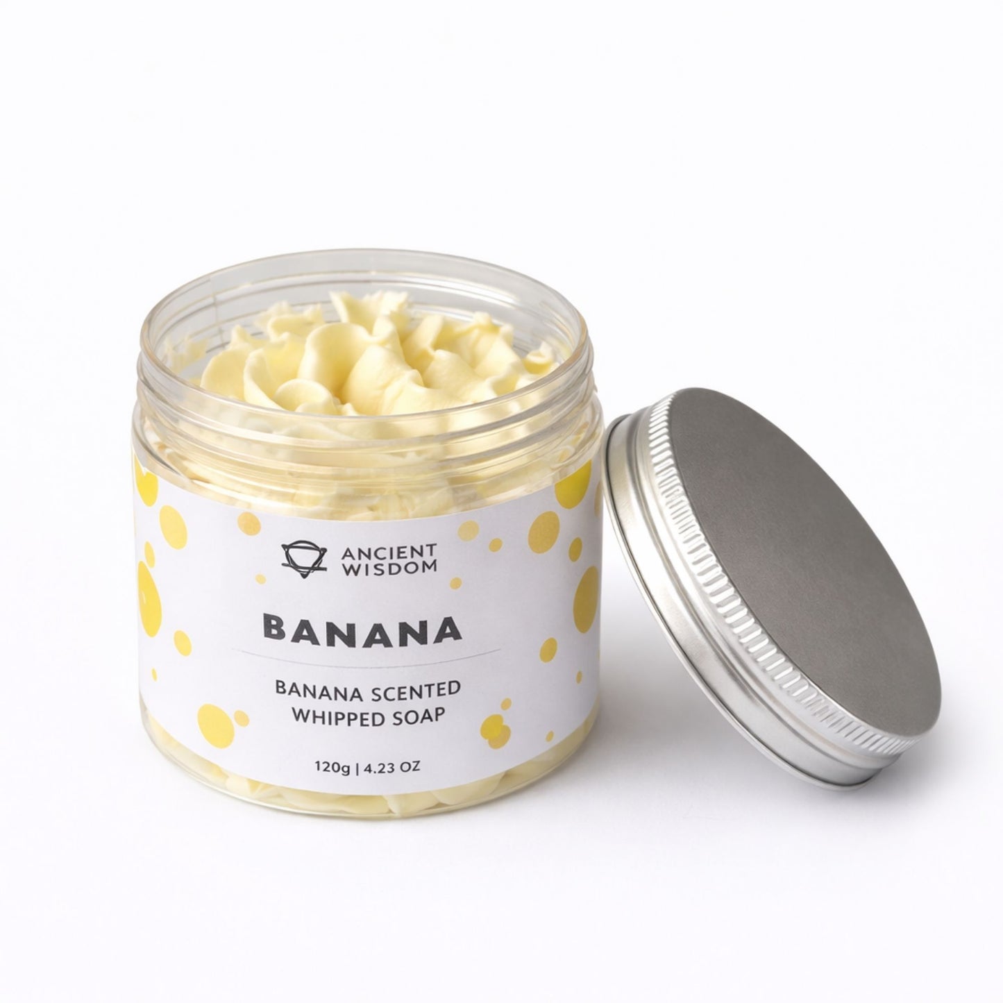 Jabón batido de plátano, color amarillo, envase de 120 g con tapa plateada, aroma dulce y divertido.