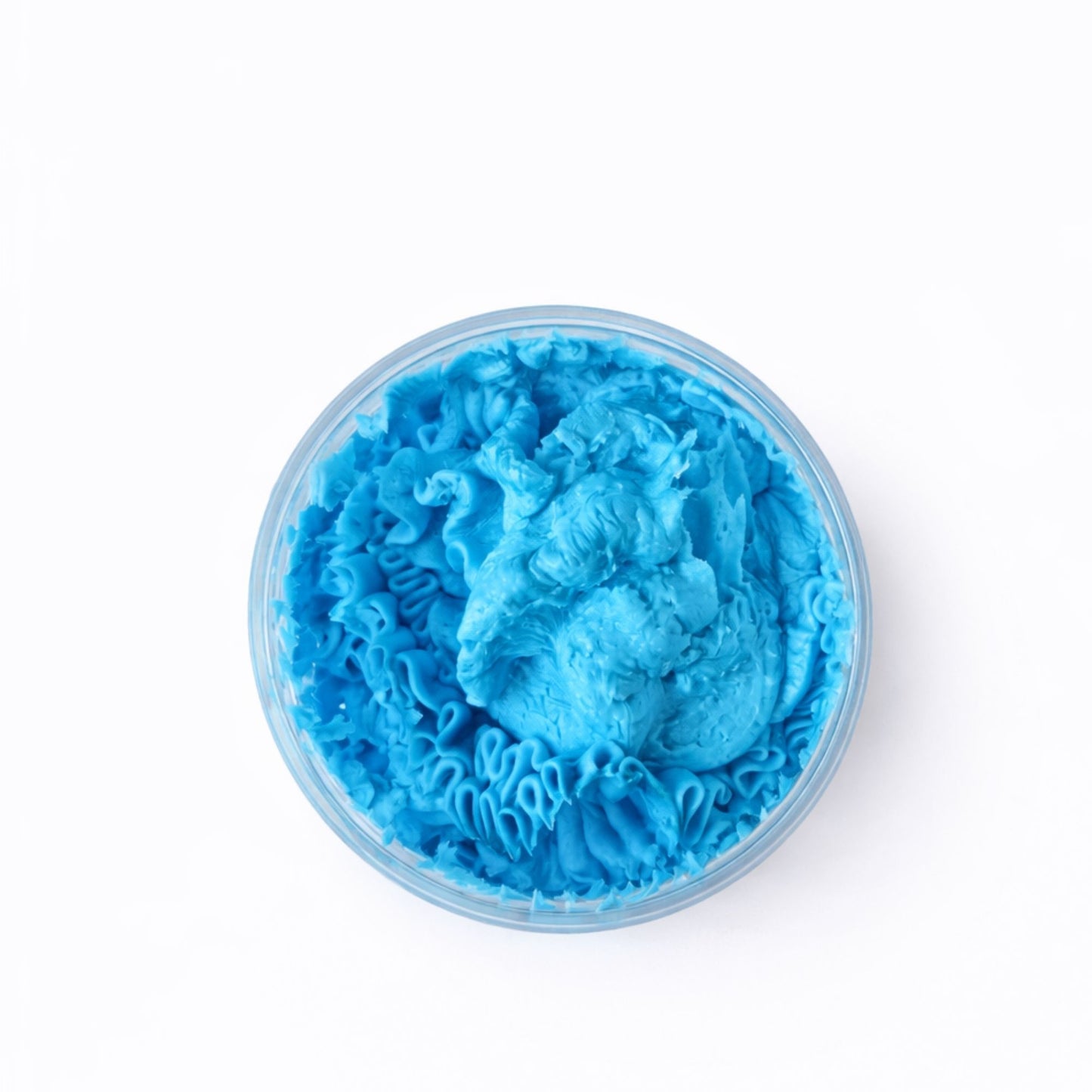 Crema de modelar azul brillante en envase transparente, ideal para peinados de estilo moderno y creativo.