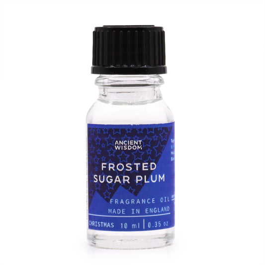 Frasco de vidrio de 10 ml con tapón negro y etiqueta azul con estampado de estrellas para aceite de fragancia.