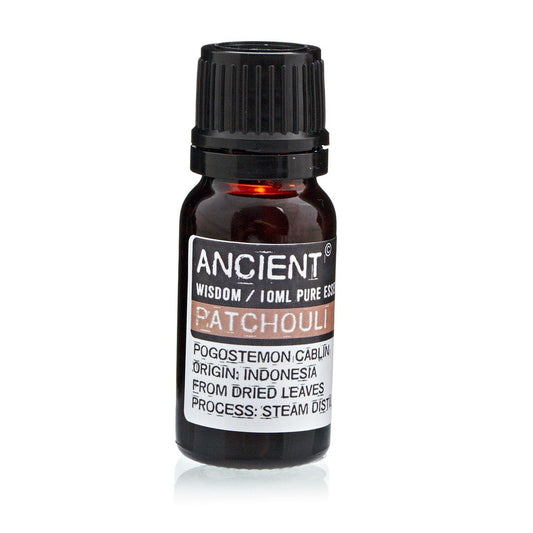 Aceite esencial de patchouli, envase ámbar de 10 ml, aroma terroso, origen Indonesia, extracción por destilación al vapor.