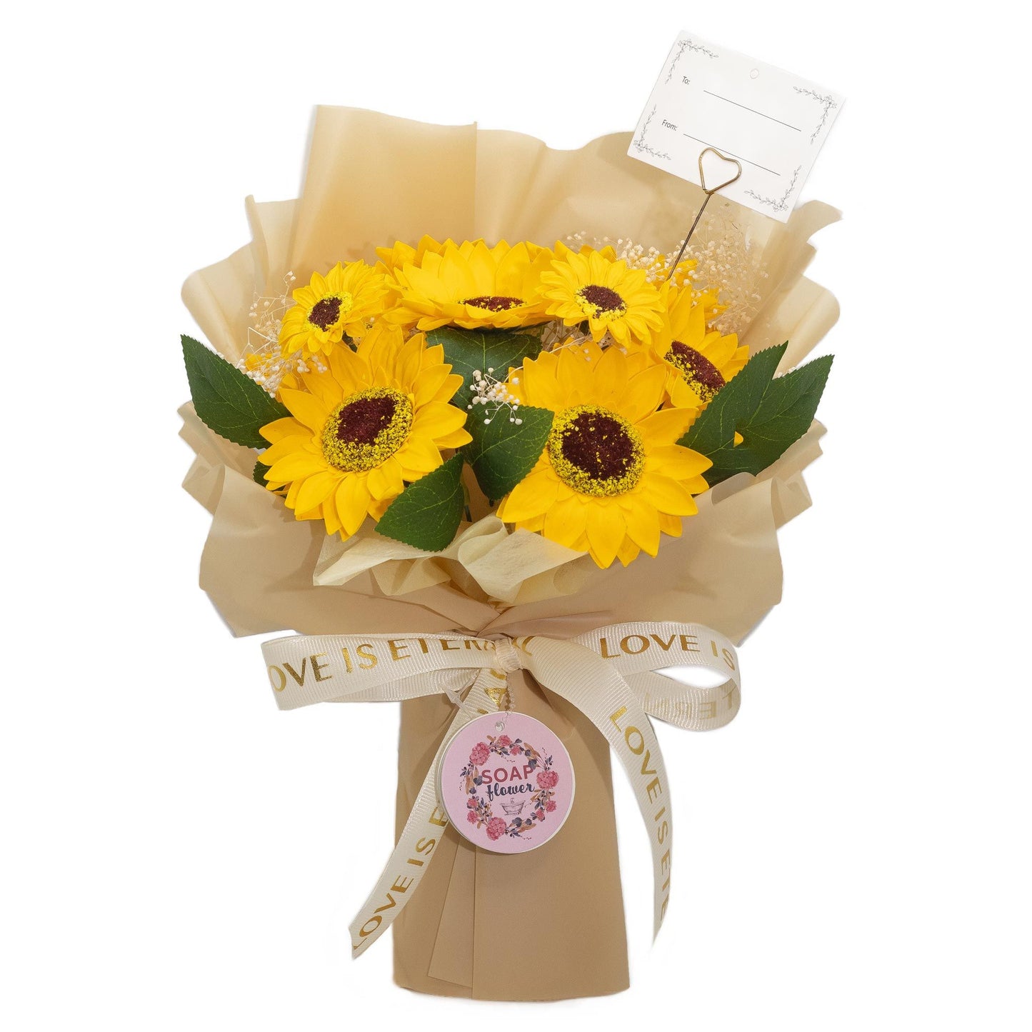 Ramo de girasoles de jabón amarillo con hojas verdes y cinta, presentación elegante en papel kraft.