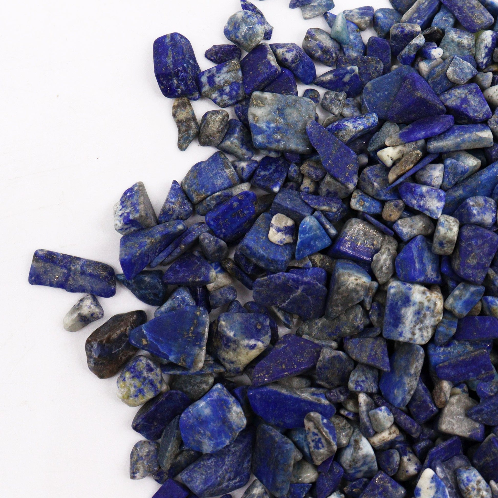 Piedra azul lapislázuli natural, trozos irregulares, ideal para manualidades y decoración, 100g.