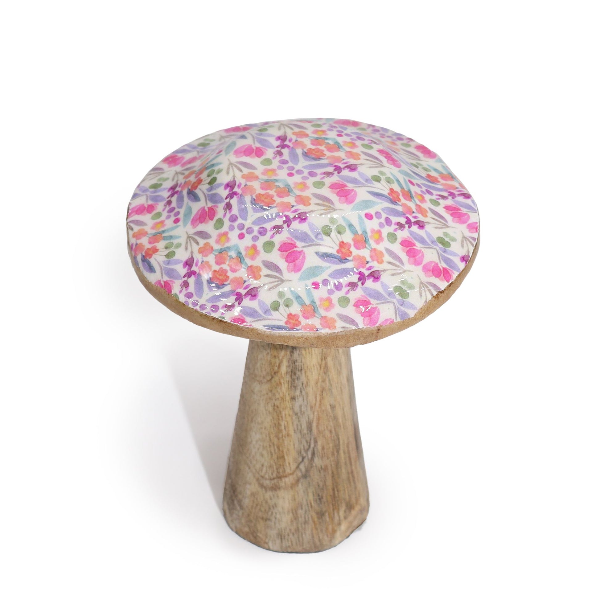 Taburete de madera con tapa de tela de flores coloridas en tonos púrpura, rosa y verde. Ideal para decoración bohemia.