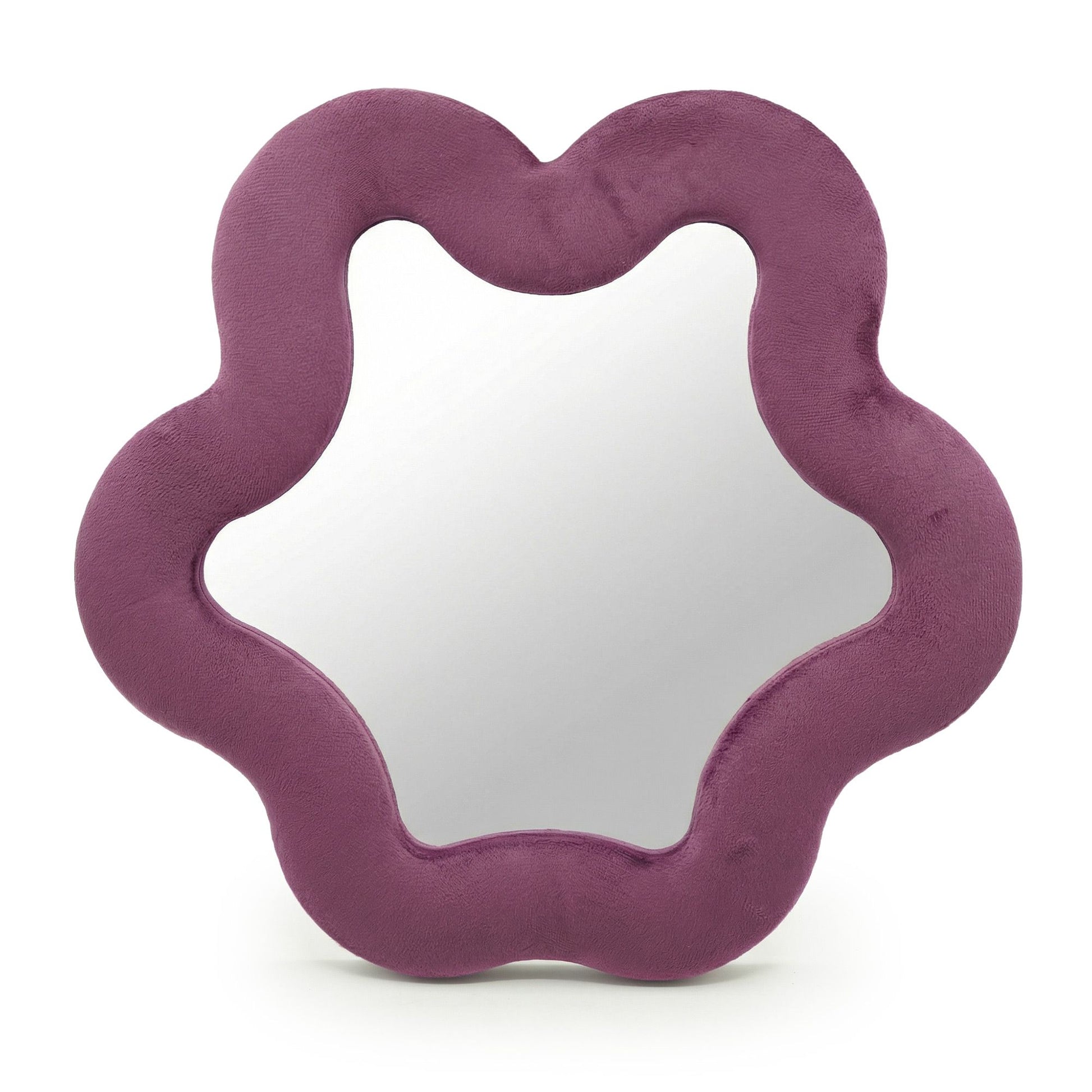 Espejo en forma de estrella con marco de textura suave color malva sobre fondo blanco.